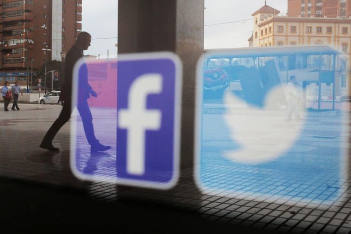 Russia opens administrative proceedings against Facebook and Twitter